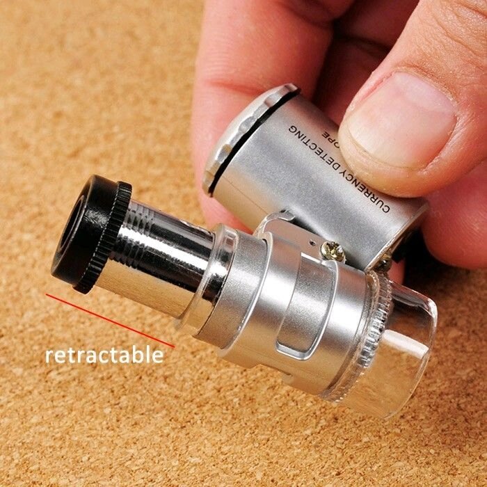 картинка Микроскоп 60x миниатюрный с подсветкой от магазина "мир Электроники"